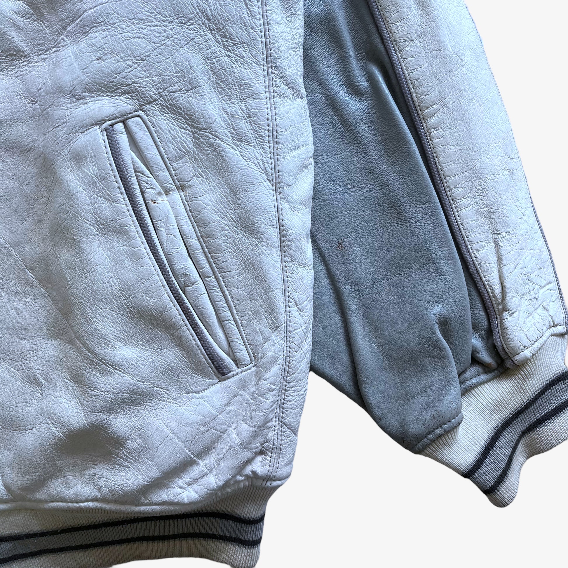 Vintage 90s Mens AVIREX White & Grey Leather Varsity Jacket With Back Embroidered Spell Out Pocket - Casspios Dream